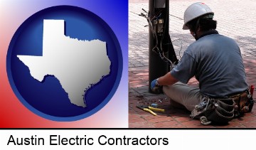 an electrician wearing a tool belt, installing electrical wiring in Austin, TX