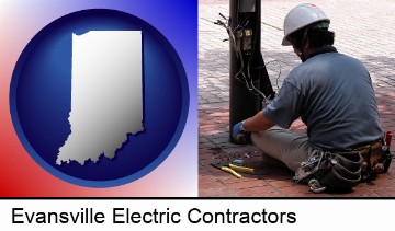 an electrician wearing a tool belt, installing electrical wiring in Evansville, IN