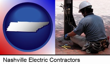 an electrician wearing a tool belt, installing electrical wiring in Nashville, TN