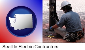 Seattle, Washington - an electrician wearing a tool belt, installing electrical wiring