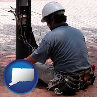 connecticut map icon and an electrician wearing a tool belt, installing electrical wiring