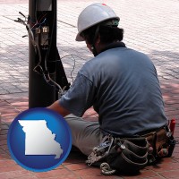 missouri map icon and an electrician wearing a tool belt, installing electrical wiring