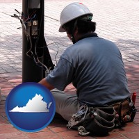 virginia map icon and an electrician wearing a tool belt, installing electrical wiring