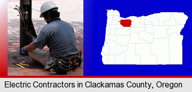 an electrician wearing a tool belt, installing electrical wiring; Clackamas County highlighted in red on a map